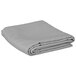 A folded gray Intedge rectangular table cover.
