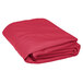 A hot pink Intedge round cloth table cover folded on a white background.