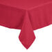A hot pink square Intedge tablecloth on a table.