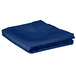 A folded royal blue Intedge cloth table cover on a white background.