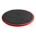A red and black circular Lancaster Table & Seating vinyl seat.