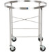 A round silver stainless steel mobile mixing bowl stand with black wheels.