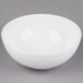 A 10 Strawberry Street Izabel Lam Pond white bone china cereal bowl on a gray surface.