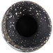 A black and white speckled stoneware sake bottle with a hole in it.