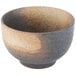 A close up of a 10 Strawberry Street Whittier Nagoya stoneware rice bowl with a brown speckled surface and black spot.
