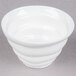 A 10 Strawberry Street bright white porcelain bowl with a white rim on a gray surface.