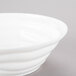 A 10 Strawberry Street bright white porcelain bowl with a curved edge.