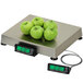 A Cardinal Detecto digital display extension cable with green apples on a scale.