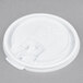 A close up of a white Solo plastic lid with a tear tab.
