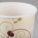 A Solo poly paper cold cup with a swirl design on it.