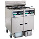 A large stainless steel Pitco electric fryer system with 2 split pot units and 2 full pot units.