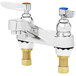 A T&S deck mounted lavatory faucet with two brass handles.