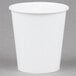 A Bare by Solo wax treated white paper cold cup on a gray surface.
