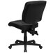 A Flash Furniture black leather mid-back office chair with wheels.