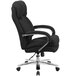 A black Flash Furniture office chair with chrome loop arms and wheels.