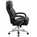 A Flash Furniture black leather office chair with wheels and chrome arms.