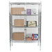 A Regency chrome wire security cage with boxes on shelves.