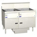 A white Pitco flat bottom floor fryer with digital controls and drawers.