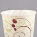 A Solo Symphony wax treated paper cold cup with a swirl design on it.