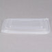 A clear plastic Genpak rectangular lid on a white surface.