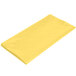 A yellow plastic table cover in packaging with a white background.