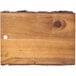 A Tablecraft acacia wood rectangular serving board with a hole in it.