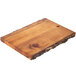 A Tablecraft acacia wood rectangular serving board with a hole in it.