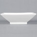 A white rectangular CAC Citysquare porcelain bowl with a square base.