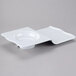 A white square Melamine tapas plate with a white background.