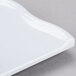 A white GET San Michele tapas plate with a curved edge.