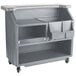 A granite and slate gray Cambro portable bar with shelves and a speed rail.