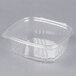 A clear plastic Genpak deli container with a clear lid.