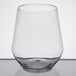 A clear plastic stemless wine goblet.
