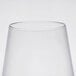 A close-up of a clear plastic stemless wine goblet.