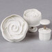 A white plastic 3-piece Ateco rose plunger cutter set.