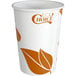 A white EcoChoice paper hot cup with orange leaf print.