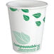 A white EcoChoice paper hot cup with green leaf print.