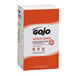 A white box with orange and white labels containing 4 cases of GOJO Natural Orange Pumice Hand Cleaner.