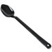A black plastic spoon with a hole in the handle.