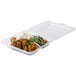 A clear plastic GET 3-compartment reusable container with food inside.