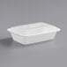 A white plastic Choice rectangular microwavable container with a lid.