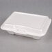 A white styrofoam Genpak large deep hinged lid container.