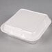 A white food container with a lid.