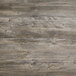 A close up of a Grosfillex VanGuard vintage pine wood table top.