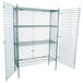A Regency wire mesh security cage with two shelves and two doors.