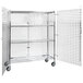 A Regency chrome wire security cage on wheels with shelves.