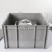 A grey plastic Vollrath Tote 'N Store chafer box with a silver lid.