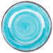 A blue and white Carlisle Melamine bread and butter plate with a swirly circle design.