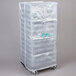 A Noble Products translucent vinyl plastic bag covering a white glass rack.