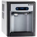 Follett 7CI100A-IW-CF-ST-00 7 Series 14 5/8" Air Cooled Chewblet Countertop Ice Maker and Water Dispenser with Filter - 7 lb. Main Thumbnail 1